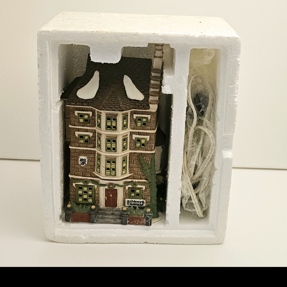 Festive Village House with Lights
